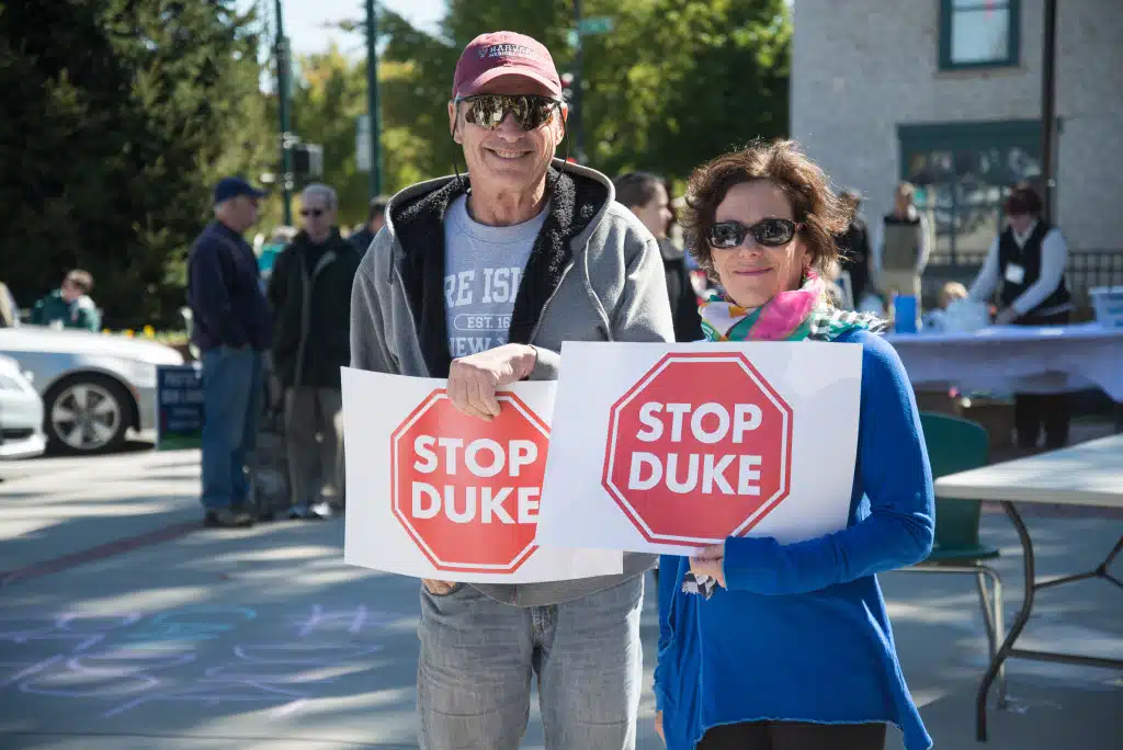 Judie Klapholz and Dr. Seinwell Steinhart of Campobello, SC. They retired to the area with hopes of setting up a horse ranch catering to visitors. Duke Energy's proposed West Carolinas Modernization project would see a transmission line go through part of their property, a new substation just down the street. Protect our Land Picnic in Hendersonville, NC on Sunday, October 18, 2015. Photo credit: katrinaohstrom.com