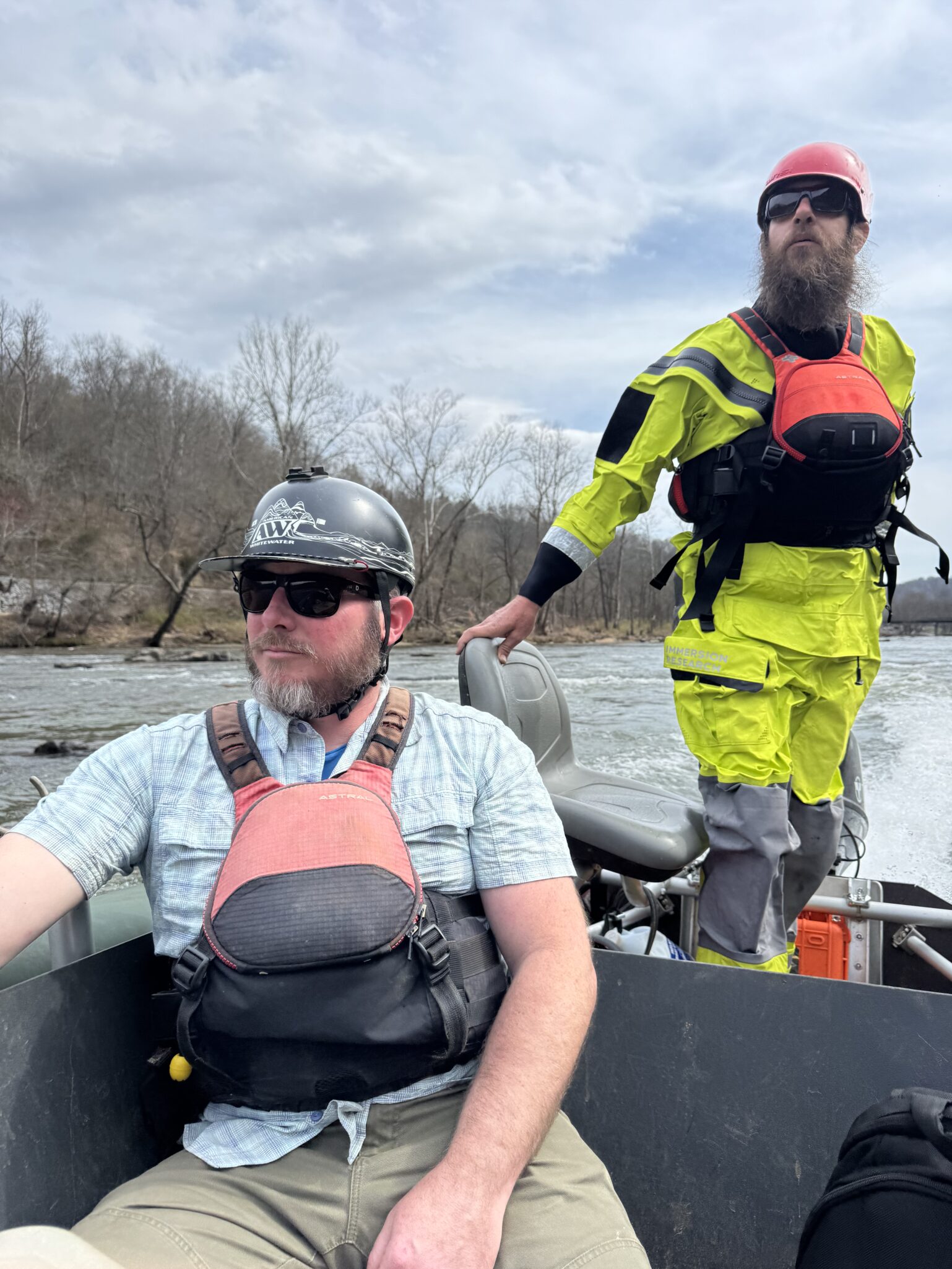 Matt Cook guides a jet boat down the French Broad River