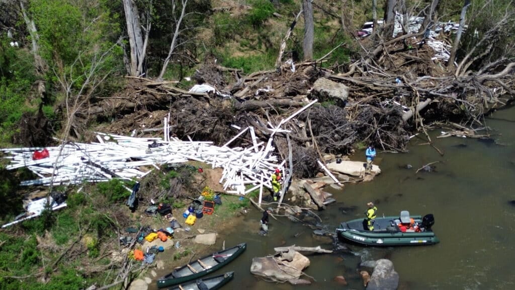 Aerial photo of a mountain of PVC pipe from IPEX's Silverline Plastic factory. During Hurricane Helen, the Woodfin, NC facility flooded, sending thousands of pounds of plastic pollution downstream.
