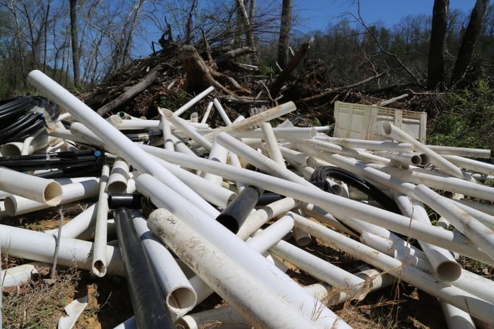 IPEX pipe litter the riverbanks